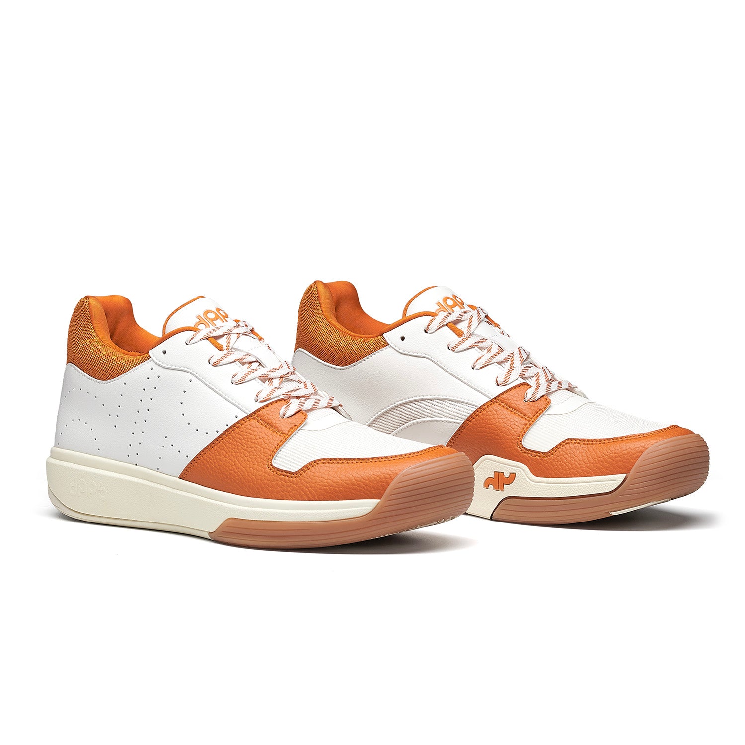 Pair of Men’s DAPS DESI Mid pickleball shoes in Burnt Orange and White – lightweight yet durable design for performance and comfort.