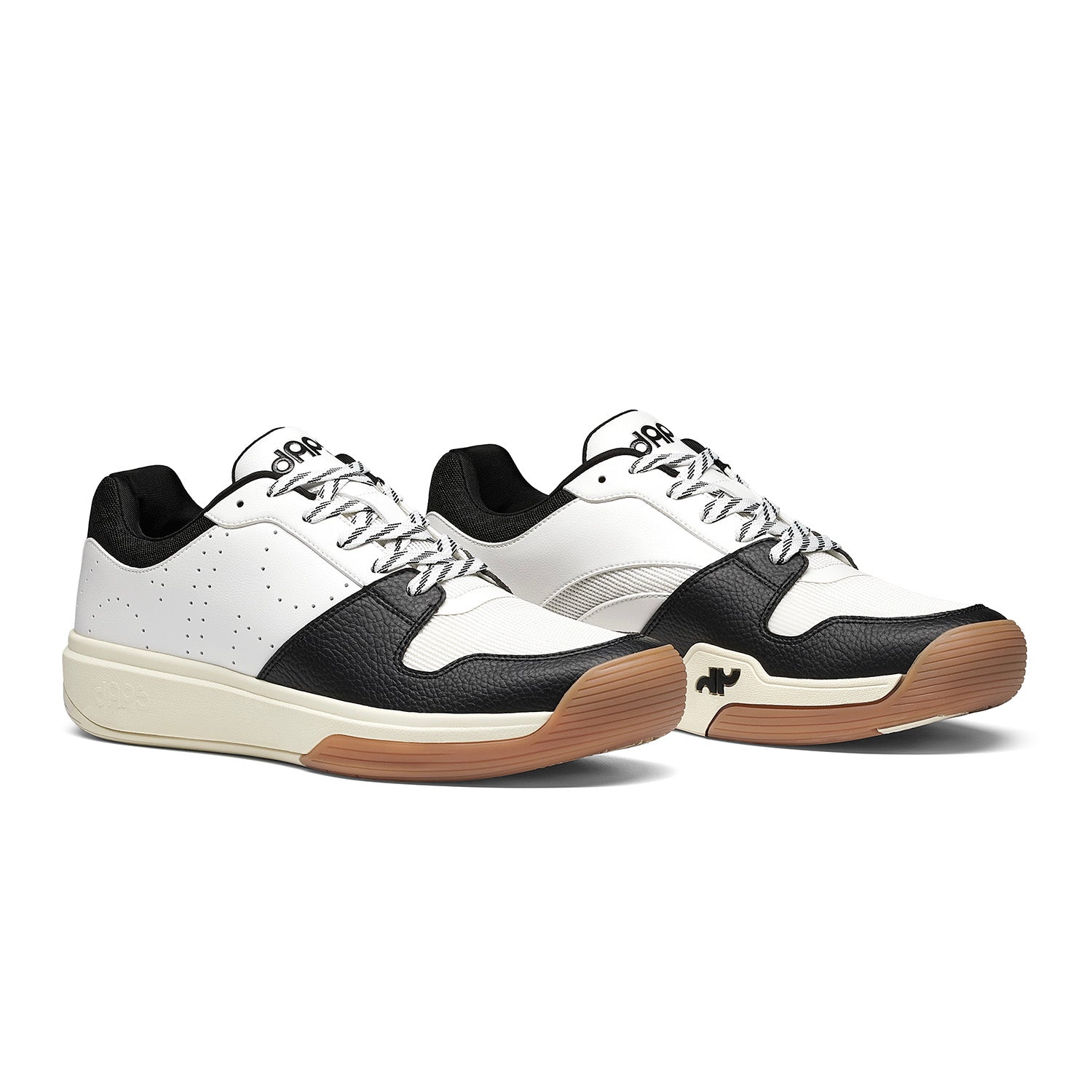 Pair of Men’s DAPS DESI Low pickleball shoes in Black and White – built for stability, traction, and fast, responsive play.